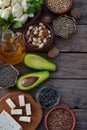 Composition of vegetarian products containing unsaturated fatty acids Omega 3 - nuts, hemp, chia, flax, avocado, soybeans, caulifl Royalty Free Stock Photo