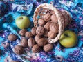 A composition of walnuts in a basket