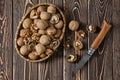 Composition with walnuts on wooden table Royalty Free Stock Photo