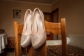 Composition - wedding shoes with decor and accessories. The concept of marriage, family relationships, wedding paraphernalia Royalty Free Stock Photo