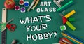 Composition of what\'s your hobby text with art supplies and apple on green table