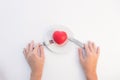 Composition on a white background of the plates, heart-shaped, h