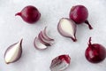 Composition of Whole, Halved and Quartered Red Onions with Copy Space