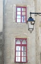 Composition of windows and a street lamp in Valence in France Royalty Free Stock Photo
