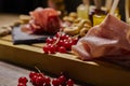 Wooden cutting board with cold cuts and cheeses Royalty Free Stock Photo