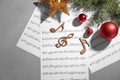 Composition with wooden music notes and decorations on grey background Royalty Free Stock Photo