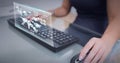 Composition of world map and digital icons on screen over woman using mouse and computer keyboard