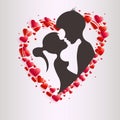Composition with a wreath of red hearts and a dark silhouette of a boy and a girl Royalty Free Stock Photo