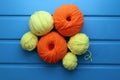 Composition with yarn balls on light blue background Royalty Free Stock Photo