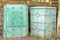 Compost plastic boxes in green full of biodegradable organic and Royalty Free Stock Photo