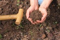 Composted earth with hands Royalty Free Stock Photo