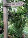 Composting area direction sign on wooden post Royalty Free Stock Photo