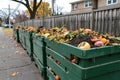 Composting bins on a city street. An urban composting program.