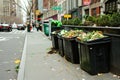 Composting bins on a city street. An urban composting program.