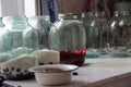 compote of berries of dogwood in a clear jar on your Desk, storage for the winter
