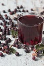 Compote of berries irgi in a glass and berries irgi