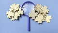Magnifying Glass Inspecting Dispersed Jigsaw Puzzle Pieces Royalty Free Stock Photo