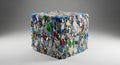 Compressed cube of recycled plastic bottles and aluminum cans for environmental sustainability Royalty Free Stock Photo