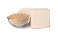 Compressed and granulated yeast on white background