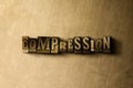 COMPRESSION - close-up of grungy vintage typeset word on metal backdrop