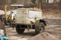 A rusty old mobile industrial compressor on a construction site. Royalty Free Stock Photo