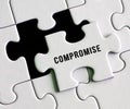 Compromise text on puzzle background Royalty Free Stock Photo