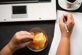 Mindless snacking, junk food. Woman eating chips Royalty Free Stock Photo