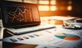 Computer and analytics monitoring corporate statistics of graph or chart on scheme. Data analysis