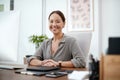 Computer, business woman and portrait in office, multimedia company and happy career mindset. Face of young Asian person Royalty Free Stock Photo