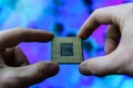 Computer chip in hands. A chipset is a set of electronic component that is integrated and flows data between the processor. Royalty Free Stock Photo