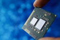 Computer chip in hands. A chipset is a set of electronic component that is integrated and flows data between the processor. Royalty Free Stock Photo