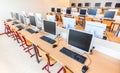 Computer class with rows of desktop computers in school Royalty Free Stock Photo