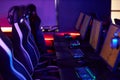 Computer Club Interior with Gaming Equipment in Row