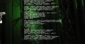 Computer code image over server racks in dark room Royalty Free Stock Photo