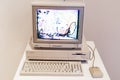 Computer Commodore Amiga 1000 with floppy disk and mouse