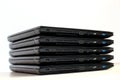 Computer Connection. Folded Stack Of Laptops On White Background Royalty Free Stock Photo