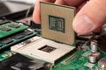 Computer CPU close-up on the motherboard background, socket of central process unit, connection of  cpu with motherboard Royalty Free Stock Photo