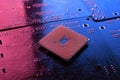 Computer cpu processor chip on circuit board ,motherboard background. Close-up. With red-blue lighting Royalty Free Stock Photo