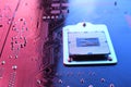 Computer cpu processor chip on circuit board ,motherboard background. Close-up. With red-blue lighting Royalty Free Stock Photo