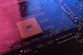 Computer cpu processor chip on circuit board ,motherboard background. Close-up. With red-blue lighting Royalty Free Stock Photo