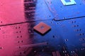 Computer cpu processor chip on circuit board ,motherboard background. Close-up. With red-blue lighting Royalty Free Stock Photo