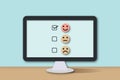 Computer with customer evaluation or positive feedback concept rating. Check mark to select smile face circle