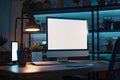 Modern Home Office Desk with Blank Computer Monitor at Night Royalty Free Stock Photo