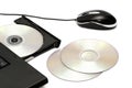 Computer disk drive and mouse Royalty Free Stock Photo