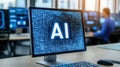 Computer displaying ai programming code on screen on blurred modern office background Royalty Free Stock Photo