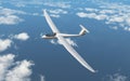 Glider over the clouds