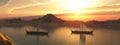 Two Viking ships on a river at sunset