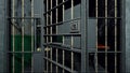 Computer generated grim prison interior through bars 3d rendering background