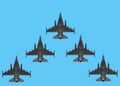 Bottom up view of five combat jet planes flying in an arrow formation