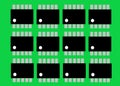 Duplicates of a simplified symbol shape of an IC Integrated Circuit component bright green backdrop